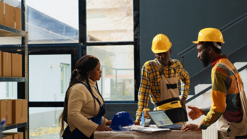 African american employees working on stock logistics